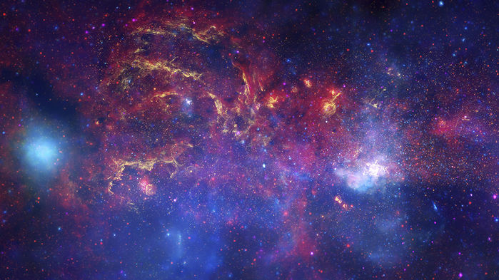 A Swarm of Black Holes May Be Lurking in Our Galaxy’s Heart
